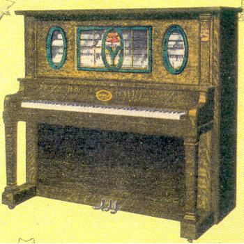 The Coinola A electric piano, a wooden upright piano cabinet with coin slot