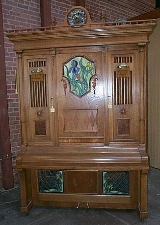 The Imhof and Mukle Commandant 2 orchestrion, a large wooden instrument with pipes and percussion